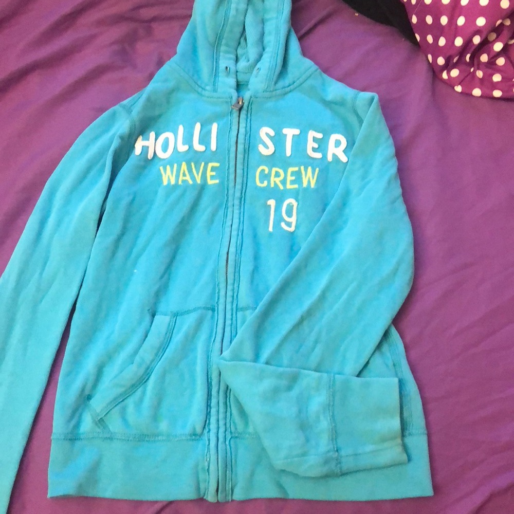 A Hollister aqua blue sweater